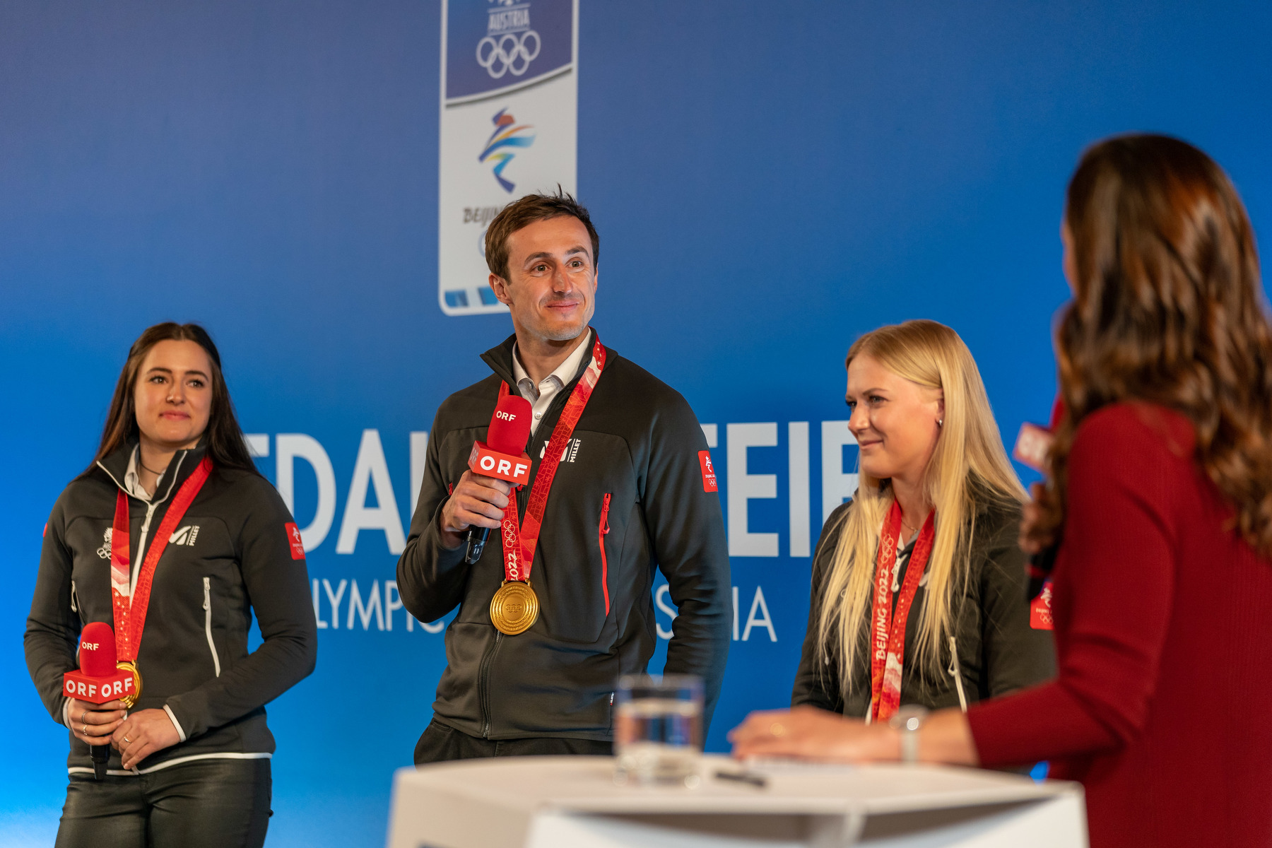VIENNA,AUSTRIA,22.FEB.22 - OLYMPICS - Winter Olympic Games Beijing 2022, Olympic Team Austria, medal celebration. Image shows Katharina Huber, Stefan Brennsteiner and Katharina Truppe (AUT). Photo: GEPA pictures/ Johannes Friedl